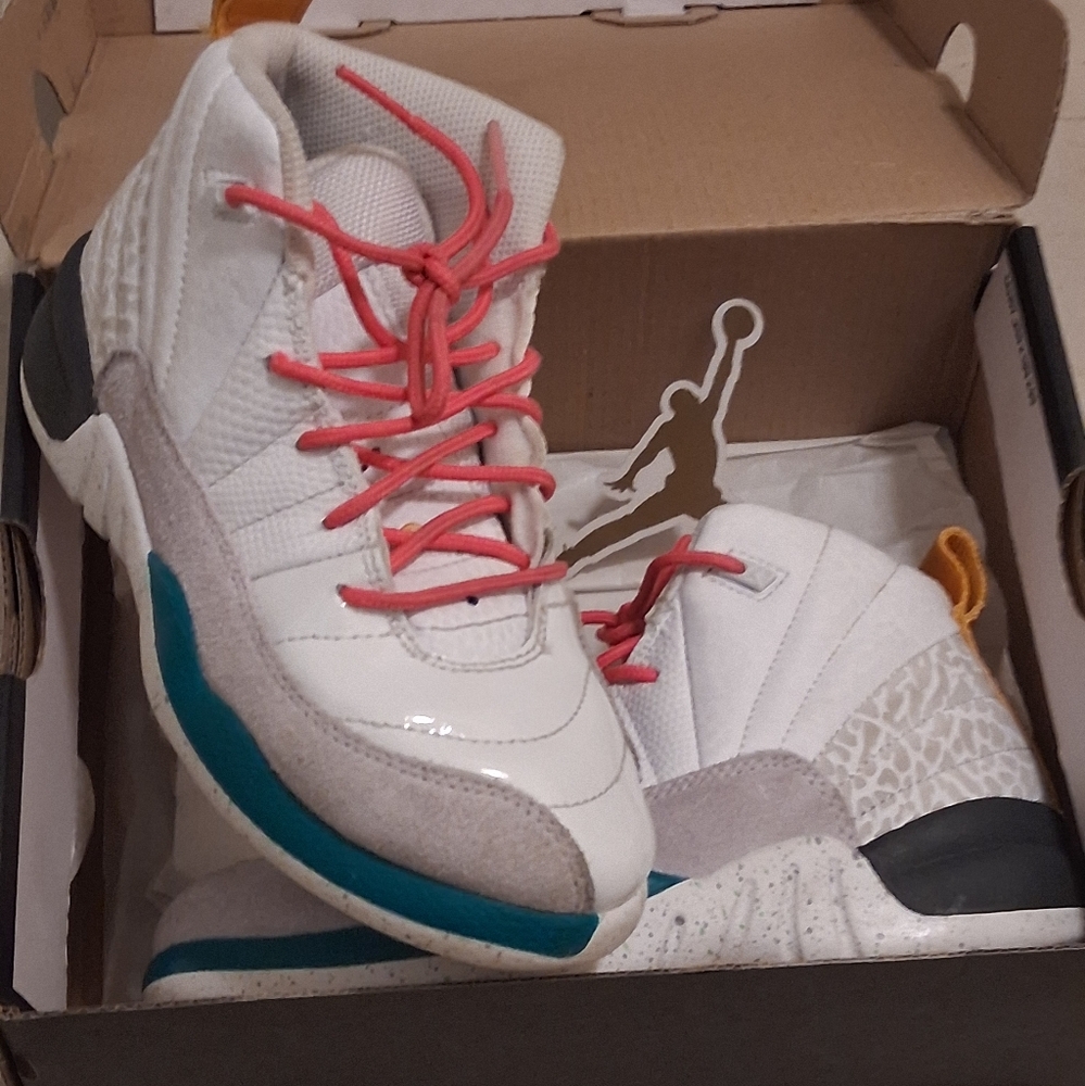 White Jordan Sneakers with Pink Laces and Blue Accents